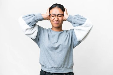 Young Uruguayan woman over isolated white background frustrated and covering ears