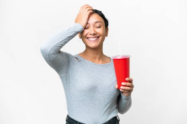 Young Uruguayan woman holding soda over isolated white background has realized something and intending the solution