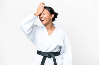 Young Uruguayan woman doing karate over isolated white background has realized something and intending the solution