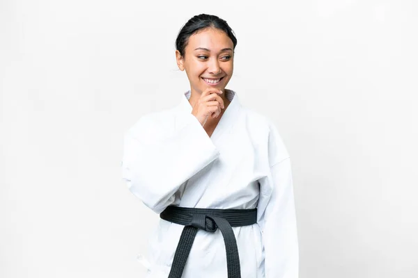 Young Uruguayan Woman Doing Karate Isolated White Background Looking Side — 图库照片