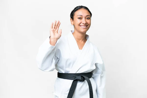 Young Uruguayan Woman Doing Karate Isolated White Background Saluting Hand — Stock Photo, Image