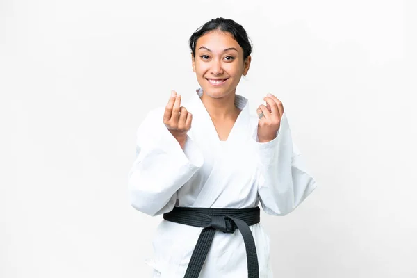 Young Uruguayan Woman Doing Karate Isolated White Background Making Money — Stock Photo, Image