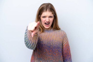 Teenager Russian girl isolated on white background frustrated and pointing to the front