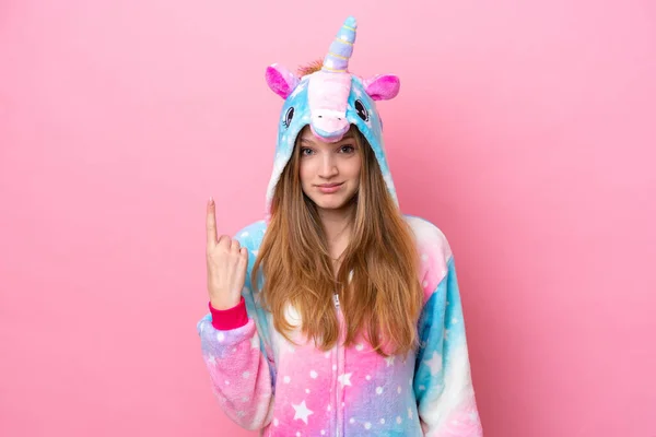 Tiener Russisch Meisje Met Eenhoorn Pyjama Geïsoleerd Roze Achtergrond Wijzend — Stockfoto