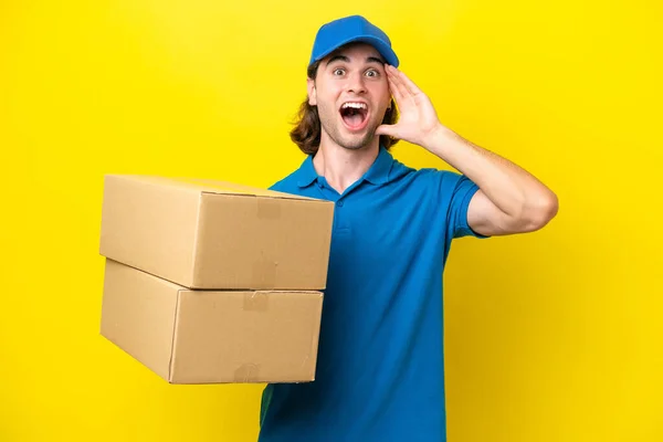 Delivery Handsome Man Isolated Yellow Background Surprise Expression — Stock Photo, Image