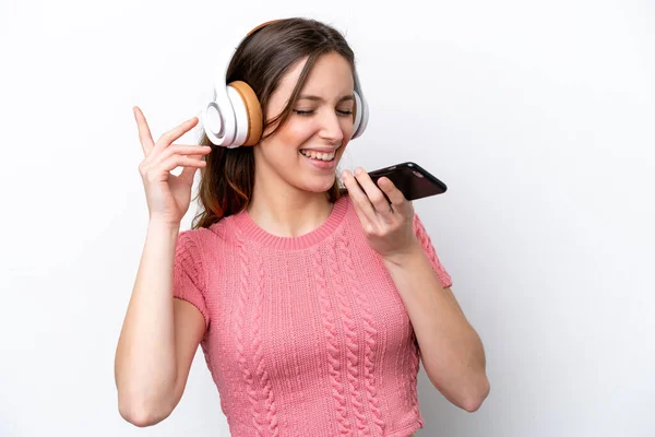 Junge Kaukasische Frau Isoliert Auf Weißem Hintergrund Musik Hören Mit — Stockfoto