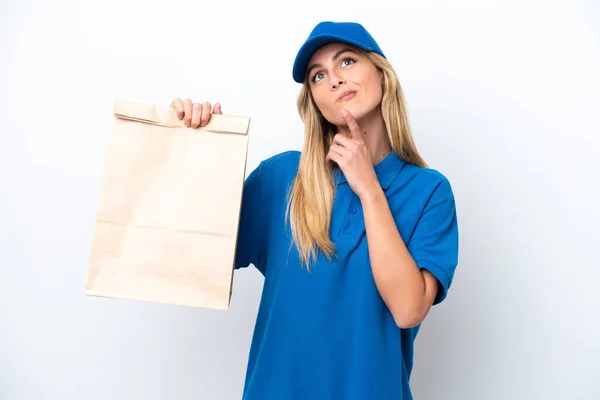 Young Uruguayan Woman Taking Bag Takeaway Food Isolated White Background — Stock Photo, Image