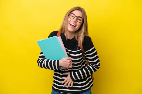 Young Student Woman Isolated Yellow Background Background Smiling Lot — Zdjęcie stockowe