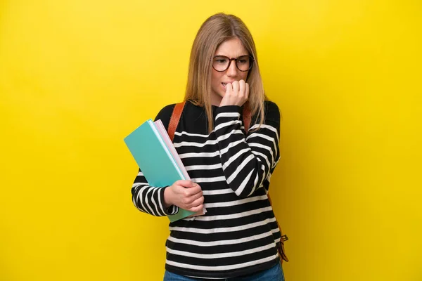 Young Student Woman Isolated Yellow Background Background Having Doubts — Stockfoto