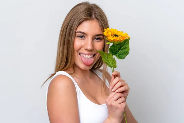 Mulher Caucasiana Jovem Isolada Fundo Branco Segurando Girassol Enquanto Sorri — Fotografia de Stock