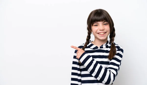 stock image Little caucasian girl isolated on white background pointing to the side to present a product