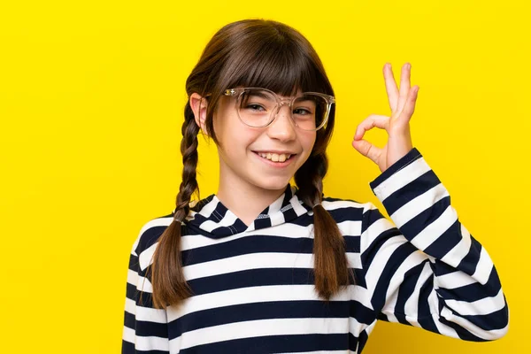 Little Caucasian Girl Isolated Yellow Background Glasses Doing Sign — Fotografia de Stock
