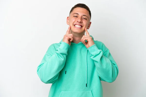 stock image Young brazilian man isolated on white background smiling with a happy and pleasant expression