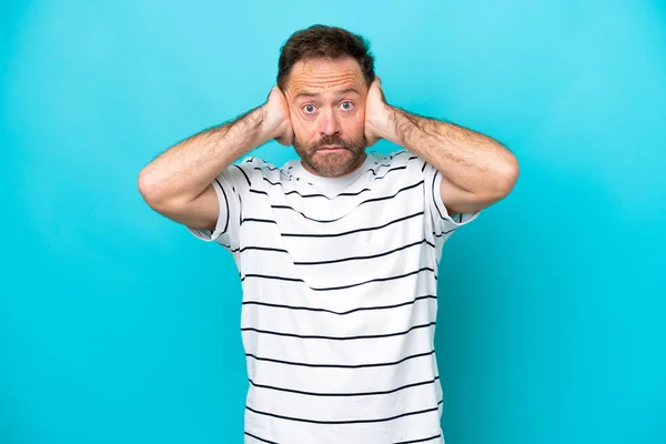 Middle Age Caucasian Man Isolated Blue Background Frustrated Covering Ears — стоковое фото