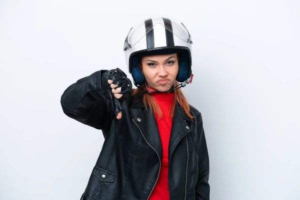 若いですロシアの女の子とともにオートバイヘルメット隔離上の白い背景ショー親指ダウンとともに負の式 — ストック写真