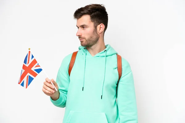 Junger Kaukasischer Student Mit Einer Britischen Flagge Auf Weißem Hintergrund — Stockfoto