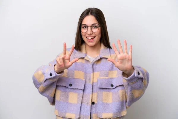 Beyaz Arka Planda Izole Edilmiş Genç Bir Kız Parmaklarıyla Sekiz — Stok fotoğraf