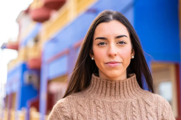 stock image Young brunette woman at outdoors . Portrait