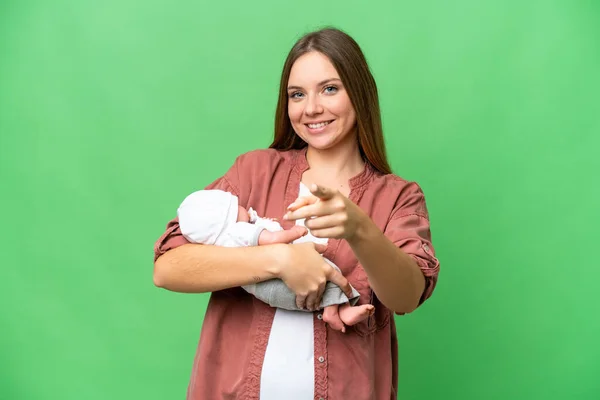 Jovem Mulher Loira Com Seu Bebê Recém Nascido Sobre Isolado — Fotografia de Stock