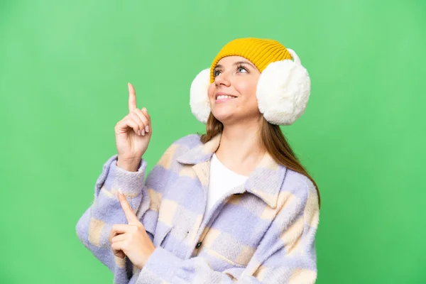 Young Blonde Woman Wearing Winter Muffs Isolated Chroma Key Background — Stock Photo, Image