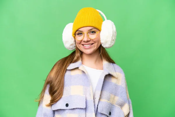 Νεαρή Ξανθιά Γυναίκα Που Φοράει Χειμωνιάτικες Μανσέτες Πάνω Από Απομονωμένο — Φωτογραφία Αρχείου