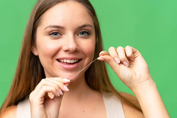Young Blonde Woman Isolated Chroma Key Background Using Dental Floss — Stock Photo, Image