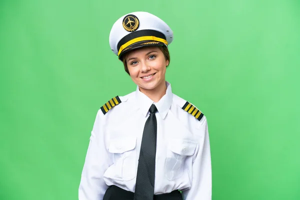 飞机驾驶员妇女克服孤立的色键背景笑 — 图库照片