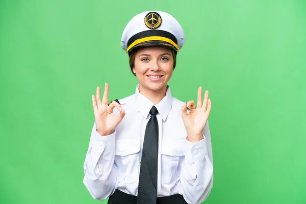 Letadlo Pilot Žena Přes Izolované Chroma Klíč Pozadí Ukazující Znamení — Stock fotografie
