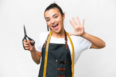 Seamstress woman over isolated white background counting five with fingers