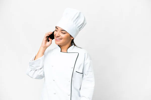 Giovane Donna Chef Sfondo Bianco Isolato Mantenendo Una Conversazione Con — Foto Stock