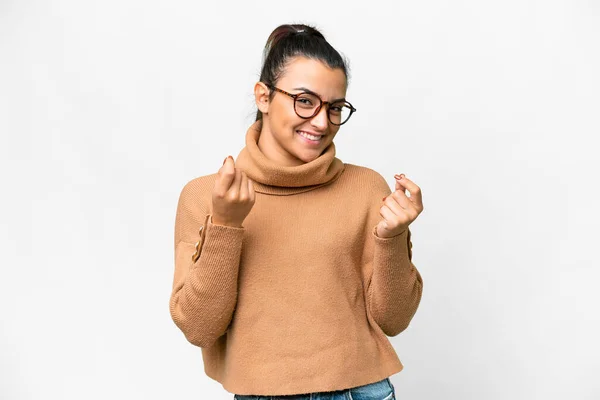 stock image Young beauty woman  over isolated white background making money gesture