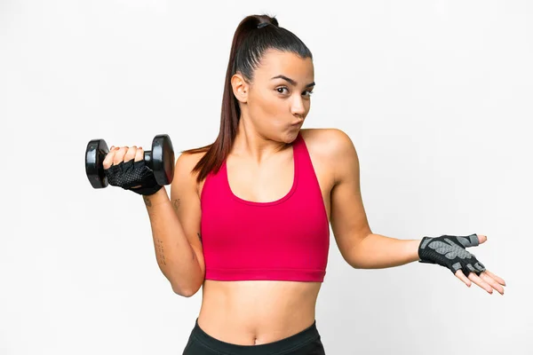 Young Sport Woman Making Weightlifting Making Doubts Gesture While Lifting — Foto Stock