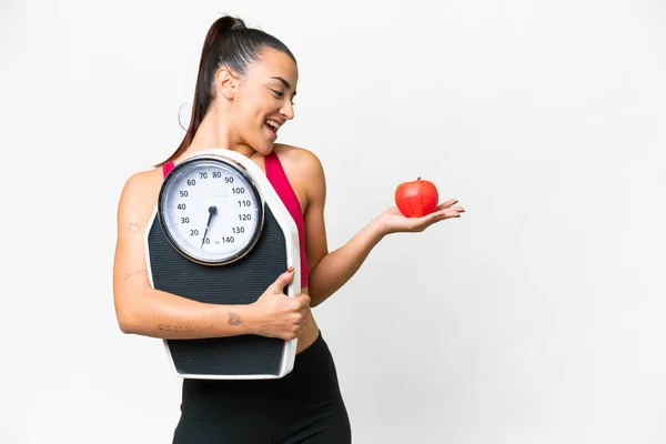 Young Beauty Woman Isolated White Background Holding Weighing Machine While — Stock Photo, Image