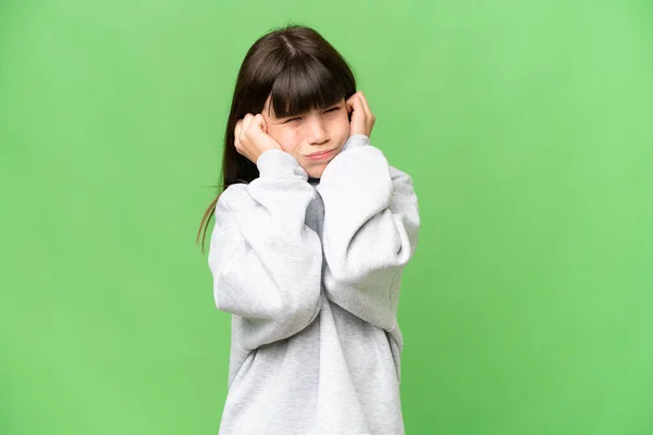 Little Girl Isolated Green Chroma Key Background Frustrated Covering Ears — Stock Photo, Image