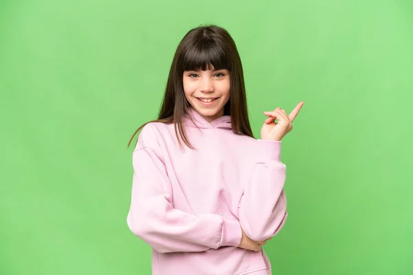 Little Girl Isolated Green Chroma Key Background Happy Pointing — Stock Photo, Image