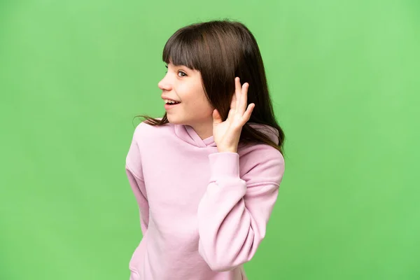 Little Girl Isolated Green Chroma Key Background Listening Something Putting — Stock Photo, Image