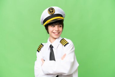 Bir uçak pilotu olarak küçük bir kız izole edilmiş bir krom anahtar geçmişi var kolları bağlı ve mutlu.