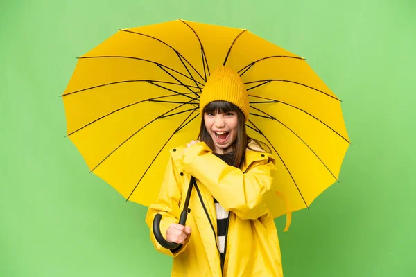 Kislány Esőálló Kabát Esernyő Felett Elszigetelt Chroma Kulcsfontosságú Háttér Ünnepli — Stock Fotó