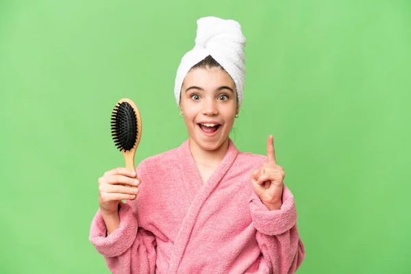 Mladá Dívka Hřebenem Vlasy Ukazuje Skvělý Nápad — Stock fotografie