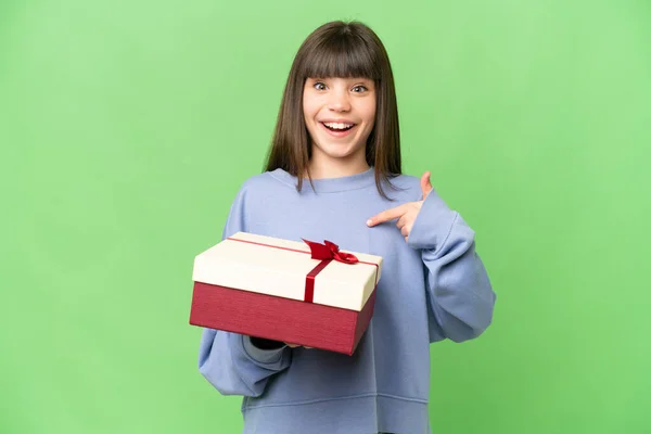 Little Girl Holding Gift Isolated Chroma Key Background Surprise Facial — Stock Photo, Image