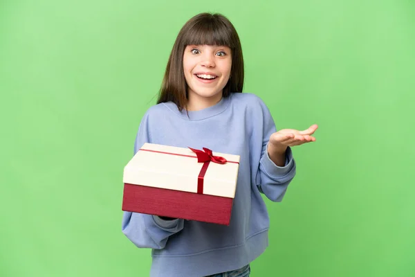 Little Girl Holding Gift Isolated Chroma Key Background Shocked Facial — Stock Photo, Image