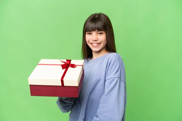 Little Girl Holding Gift Isolated Chroma Key Background Smiling Lot — Stock Photo, Image