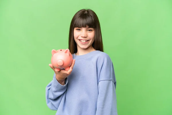 Little Girl Holding Piggybank Isolated Chroma Key Background Smiling Lot — Stock Photo, Image
