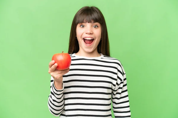 Kleines Mädchen Mit Einem Apfel Über Isoliertem Chroma Schlüsselhintergrund Mit — Stockfoto