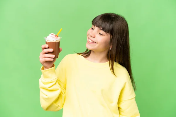 stock image Little girl with chocolat cream over isolated chroma key background with happy expression