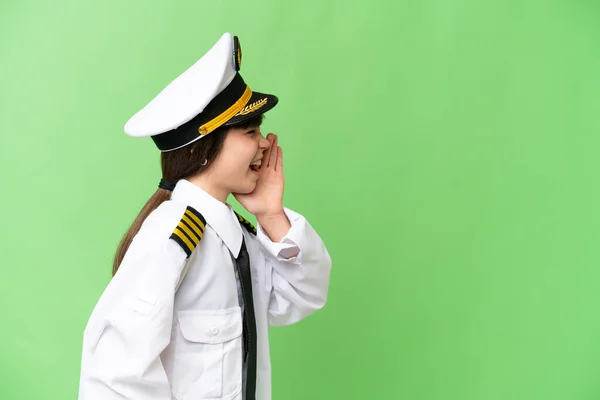 Κοριτσάκι Πιλότος Αεροπλάνου Πάνω Από Απομονωμένο Φόντο Chroma Κλειδί Φωνάζοντας — Φωτογραφία Αρχείου