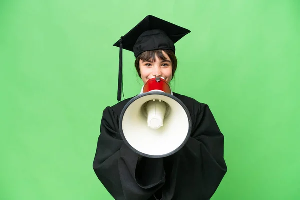 stock image Little university girl over isolated background shouting through a megaphone