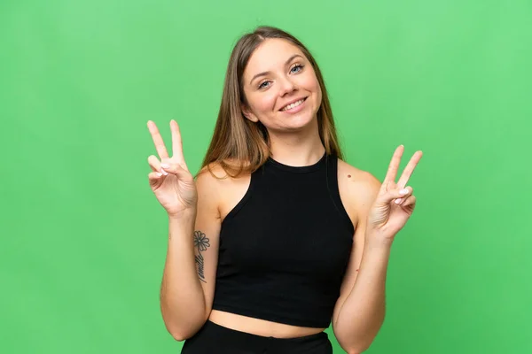Young Blonde Woman Isolated Chroma Key Background Showing Victory Sign — Stock Photo, Image