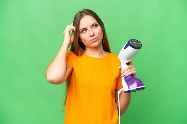 Young Blonde Woman Holding Vertical Steam Iron Isolated Chroma Key — Stock Photo, Image