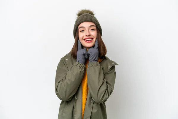 冬のジャケットを身に着けている若いウクライナの女性は幸せと快適な表情で笑顔白い背景に隔離 — ストック写真